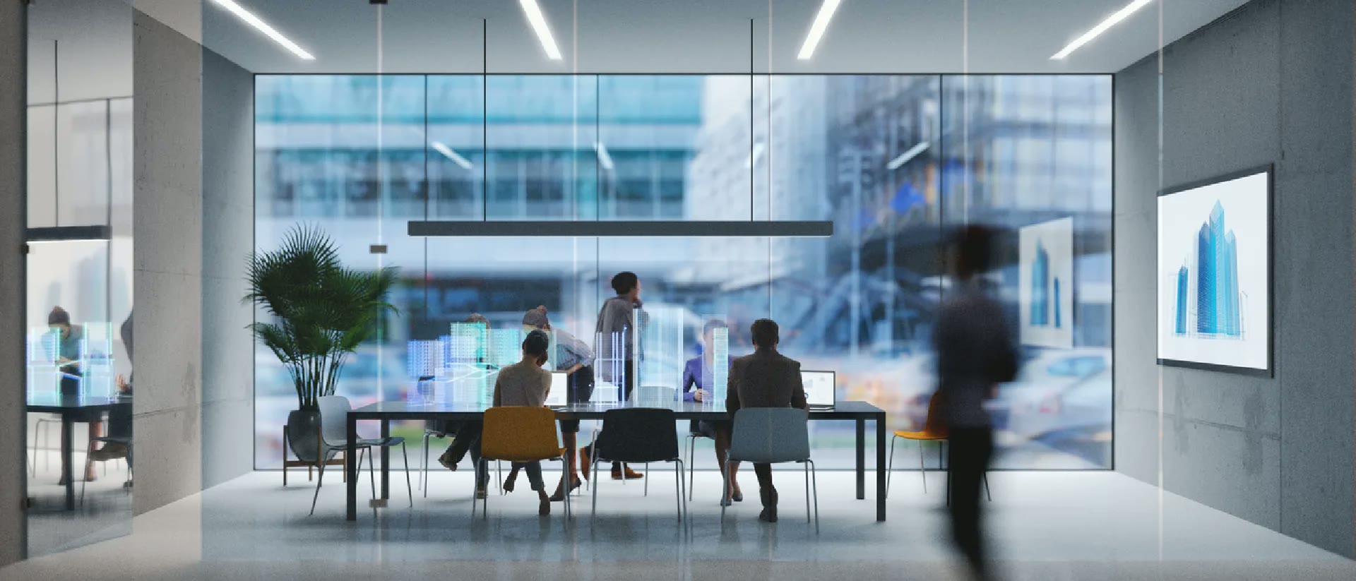 Executives around a table in a glass-walled meeting room
